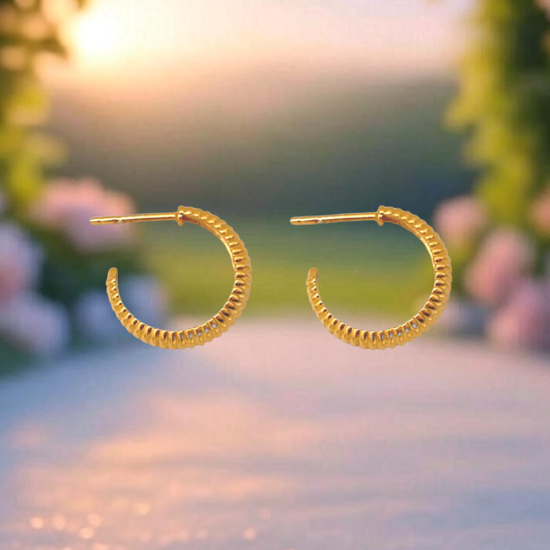 Unveiling the Elegance: Starkle's Gold Caterpillar Hoops