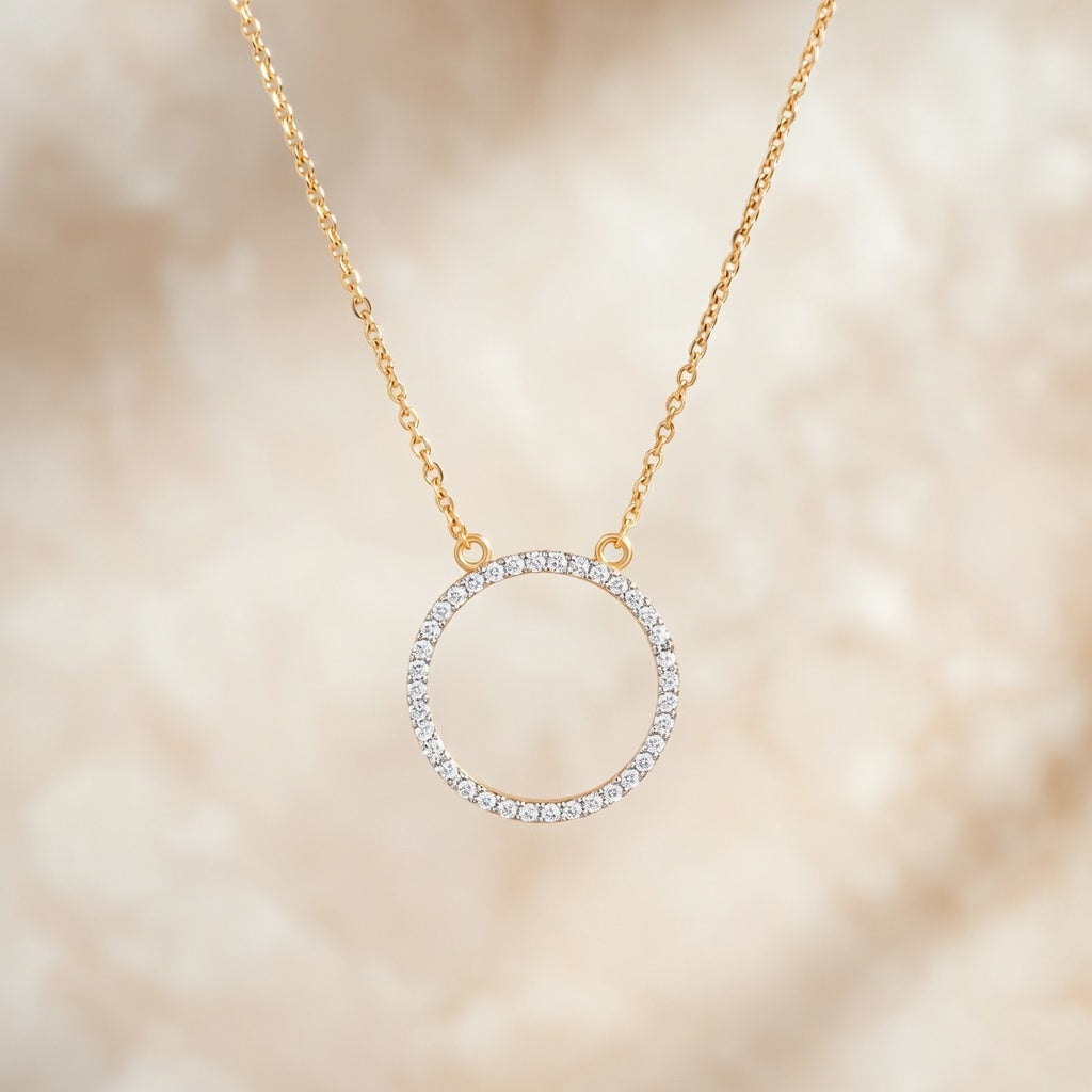 A circle of brilliance surrounding eternal elegance — the halo necklace that defines quiet luxury.