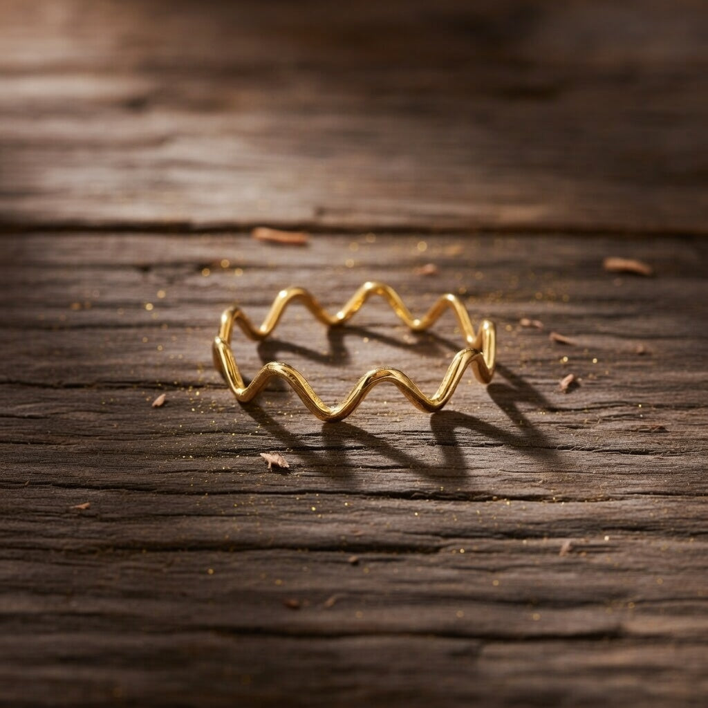 Waves of Timeless Elegance in Pure Gold: Discover Exquisite Gold Rings from Starkle