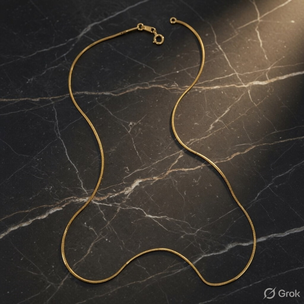 The Gold Box Snake Chain — Where Elegance Slithers In